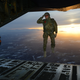 Illustration for article titled This photo of a soldier suspended in midair is so badass it looks fake